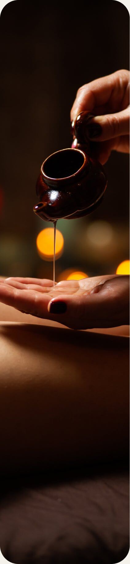 Application d'huile de massage bio